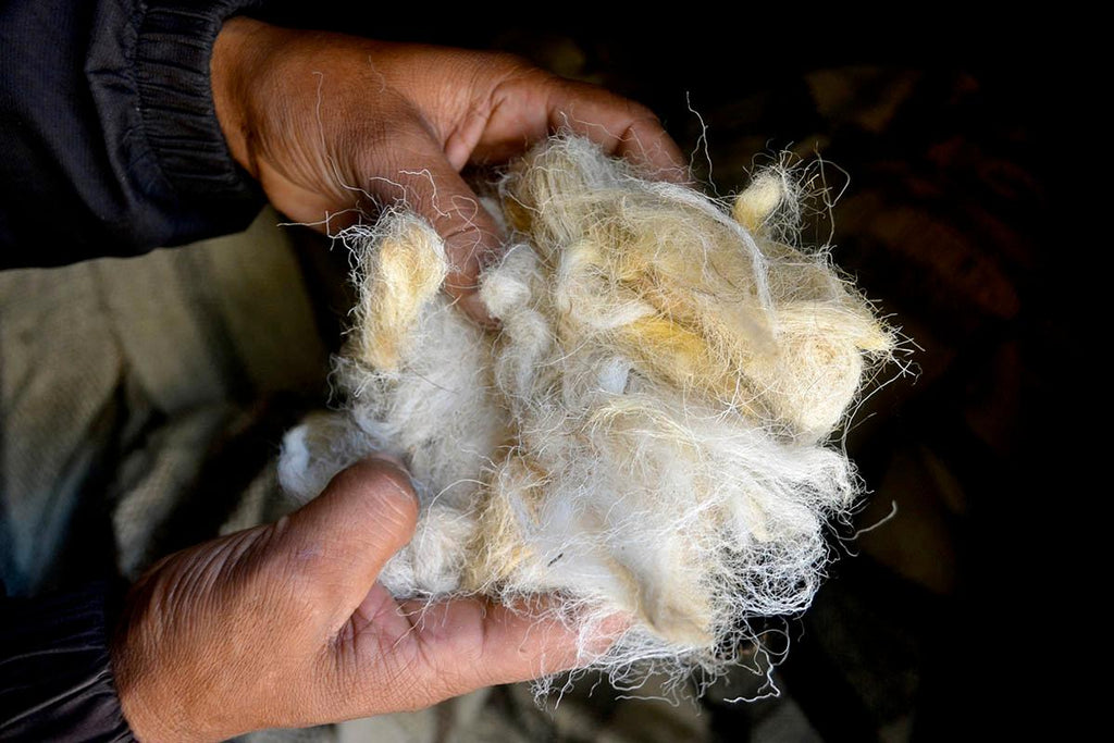 Pue yak wool man weaving yak wool fabrics in nepal